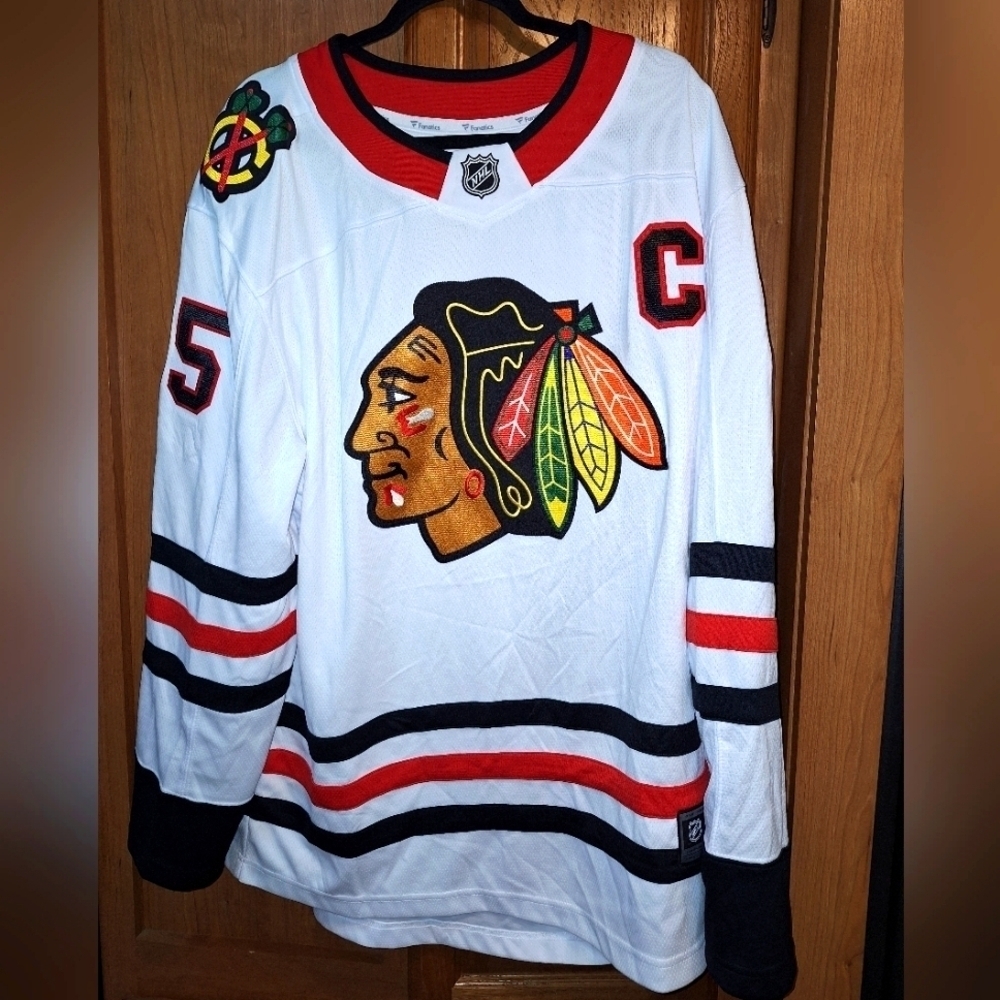 A Fanatics official NHL Chicago Blackhawks #35 Creticos jersey in a men's XL.